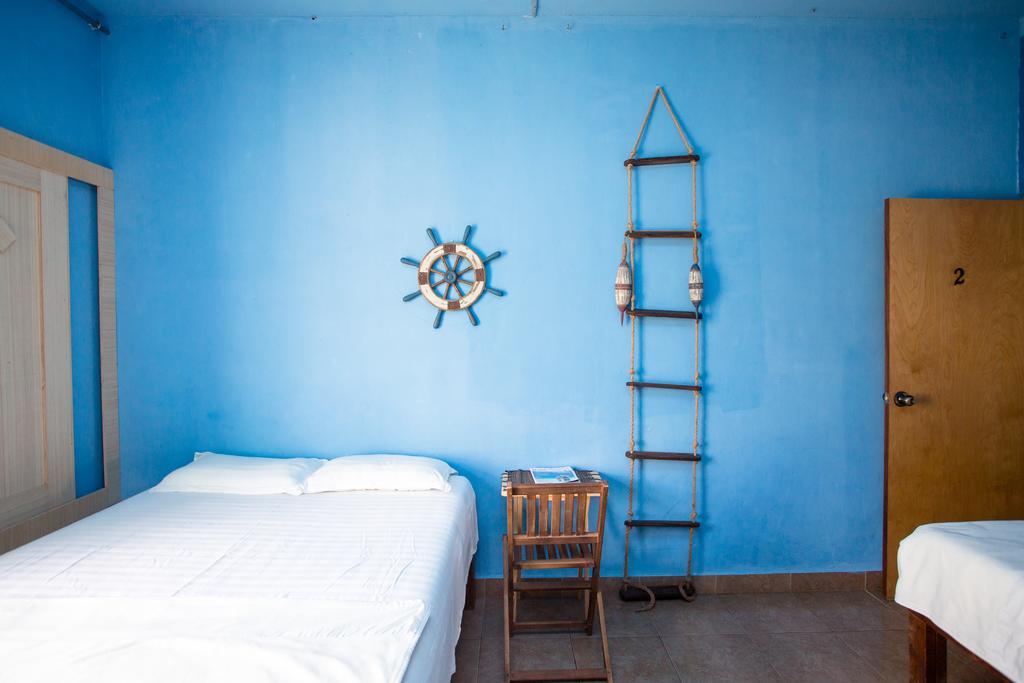 G.T. Guest House Garapan Habitación foto