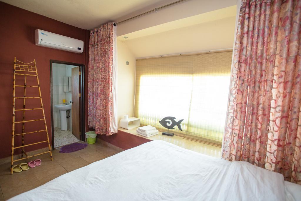 G.T. Guest House Garapan Habitación foto
