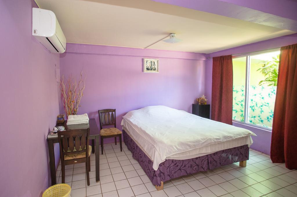 G.T. Guest House Garapan Habitación foto